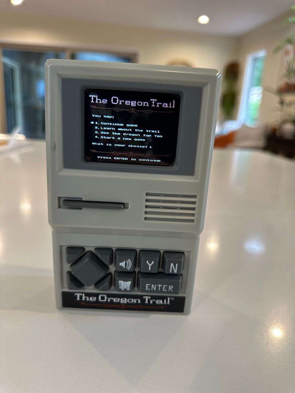 Basic Fun! The Oregon Trail Electronic Handheld Game